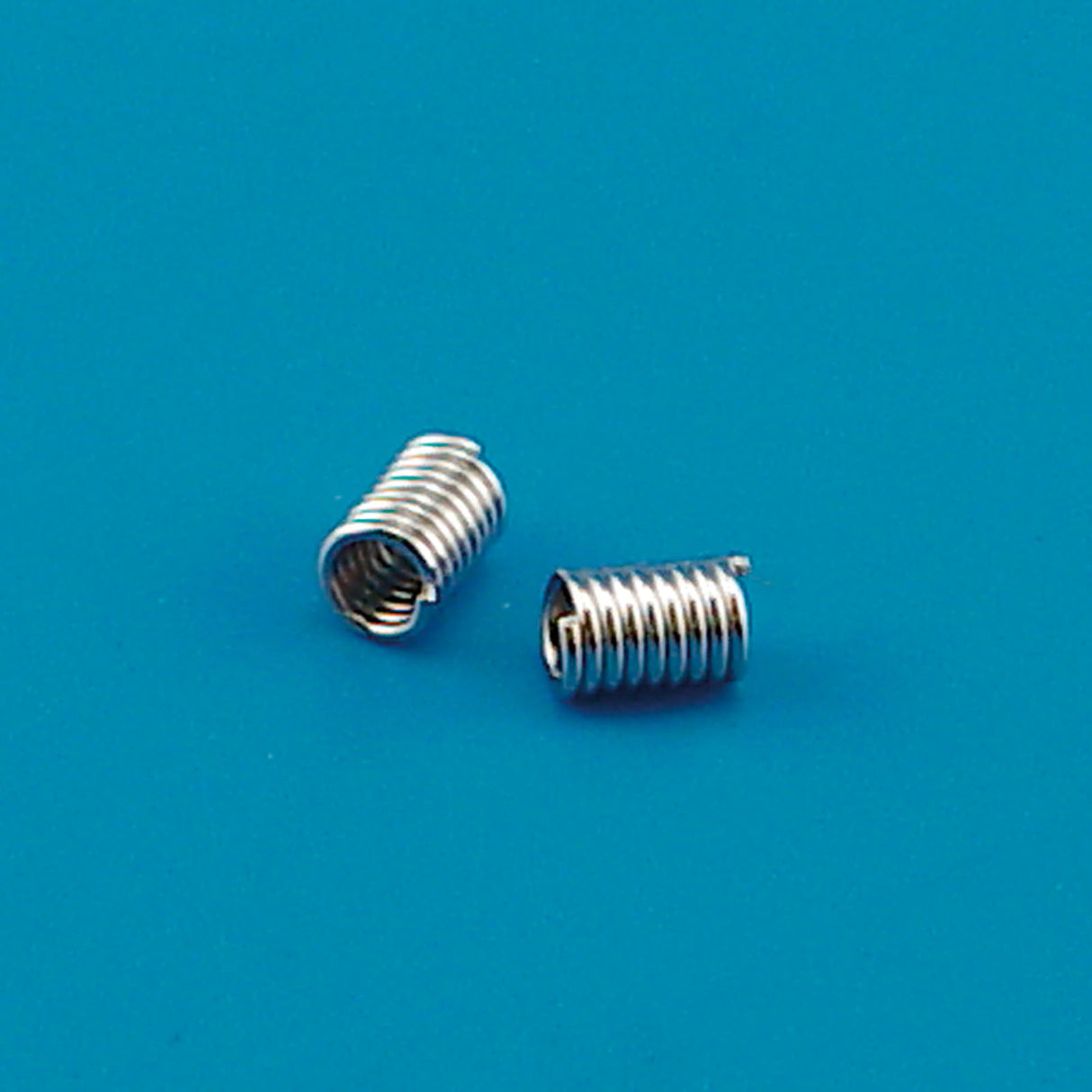 Darice • Spulenabstandshalter 18 Stück 5x8mm Silber
