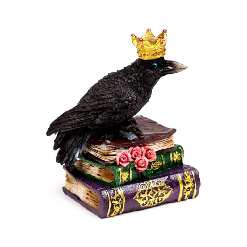 Krähe mit Krone steht auf Büchern