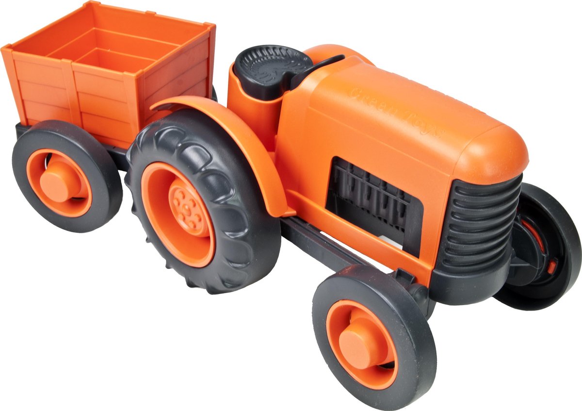 Grüner Spielzeugtraktor mit Anhänger – orange