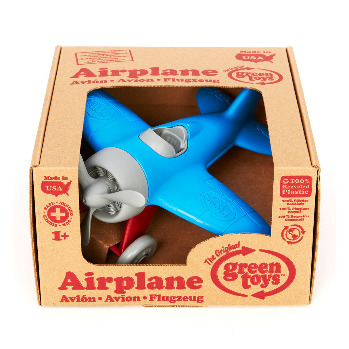 Grünes Spielzeugflugzeug - blau