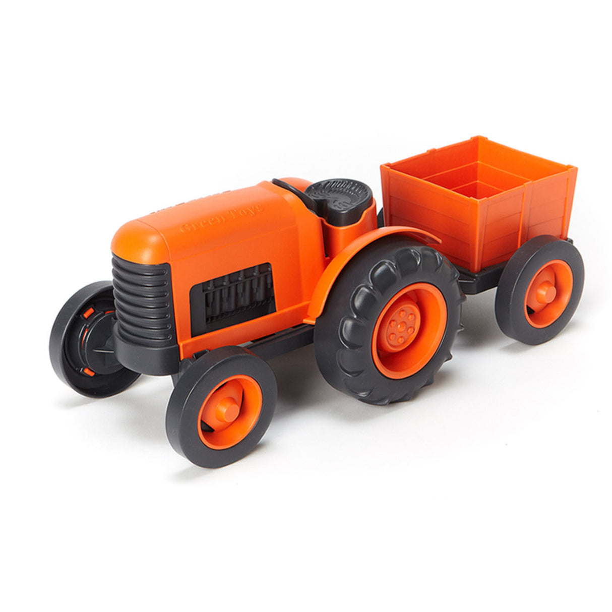 Grøn legetøjs traktor med trailer orange