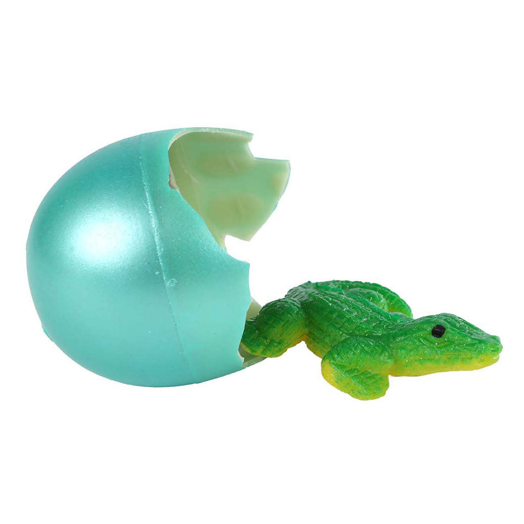 Jungle Expediton Egg con coccodrillo in crescita, 6 cm