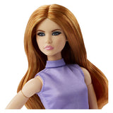 Mattel sieht modische Puppe rotes Haar und Outfit lila aus