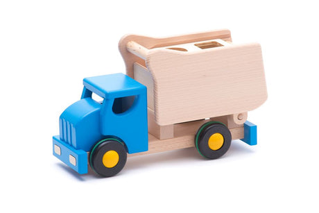 Bajo-Muldenkipper aus Holz mit blauen Blöcken.