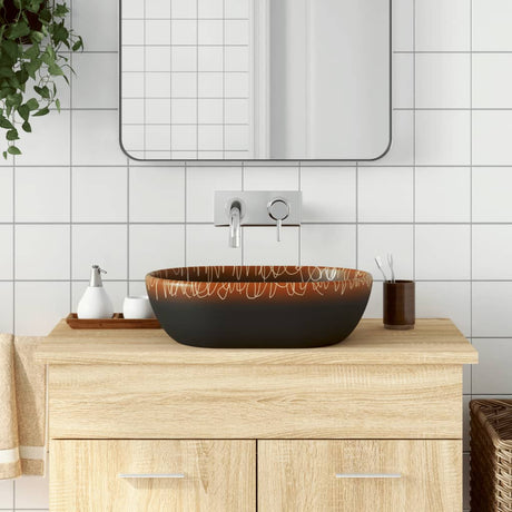 Vidaxx Aufsatzwaschbecken oval 47x33x13 cm Keramik schwarz und orange