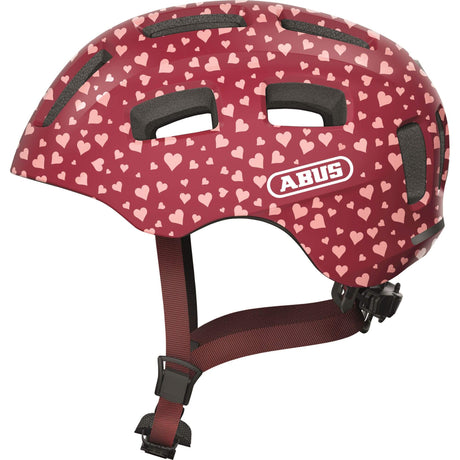 Abus Fahrradhelm youn-i 2.0 – mit Licht für Kinder, Jugendliche und junge Erwachsene – für Mädchen und Jungen – rot mit Herzmuster, Größe M
