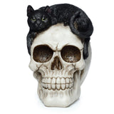 Totenkopf mit schwarzer Katze als Wohnaccessoire