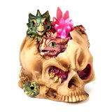 Elements Babydrache führte Kristallschädel