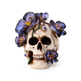 Totenkopf mit lila Kletterblumen