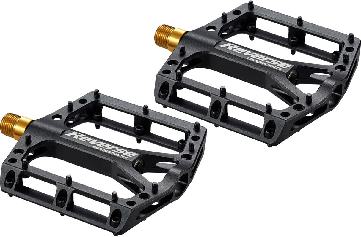 Reverse Components schwarze Plattformpedale aus Titan