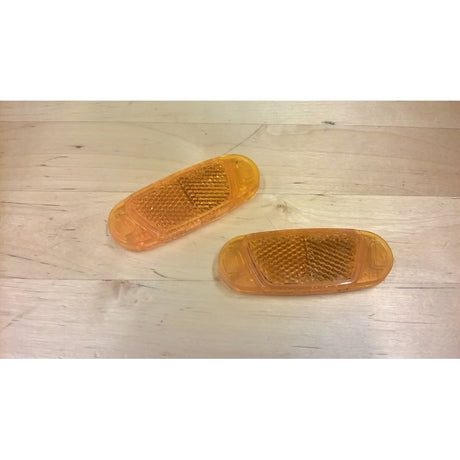 Set mit 2 orangefarbenen Speichenreflektoren